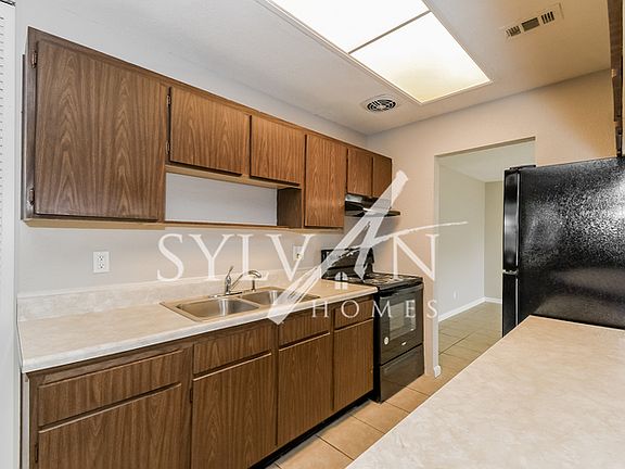 5th image of 7641 Knoll Dr N