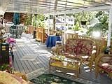 Trek decking that is full length of home. Partially covered for yr. round use.
