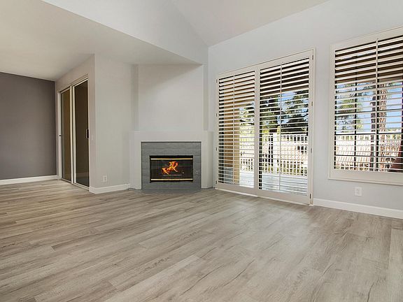 Living Room has a beautiful Fireplace