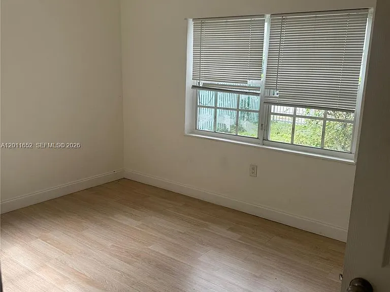 411 NW 106th St — Photo 11