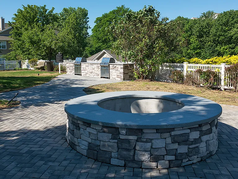 Stay warm next to our outdoor firepit