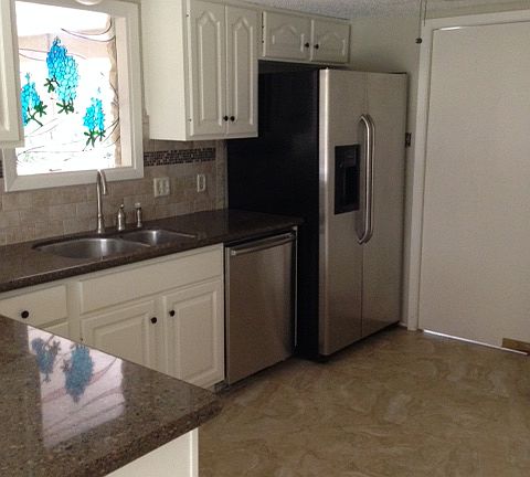 WHITE CABINETS AND STAINLESS