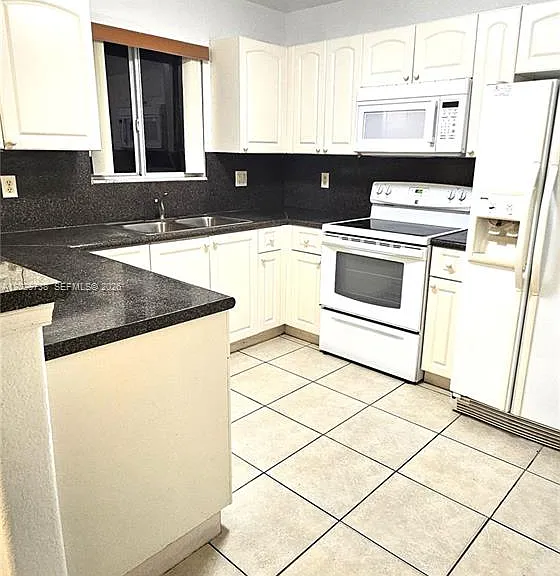 7309 NW 173rd Dr #104 — Photo 3