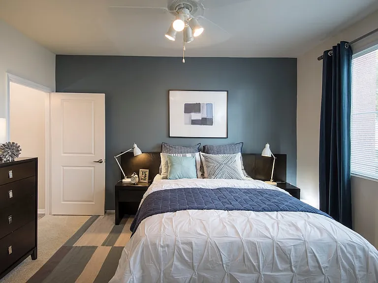 Classic Package I primary bedroom with carpeting