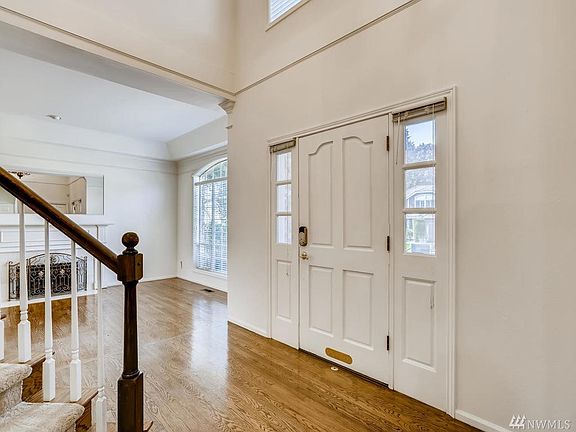 Gleaming hardwoods and vaulted ceilings greet you!