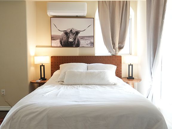 Bed is a 12" memory foam full bed with a leather wrapped headboard