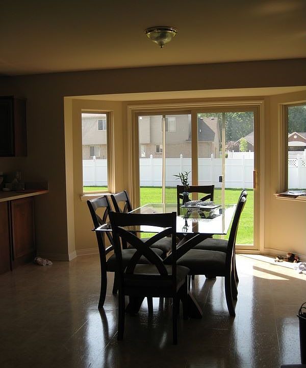 Dining room with back yard door