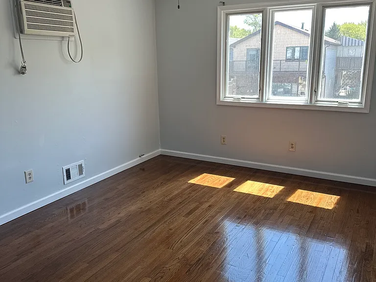 Room 2 with built in Wall AC unit in addition to Central Air.
