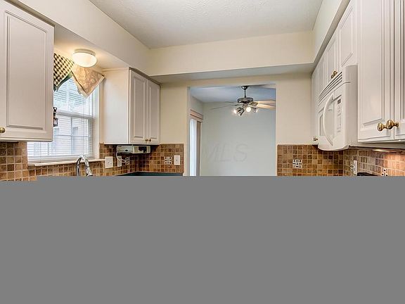 3rd image of 6229 McNaughten Place Ln