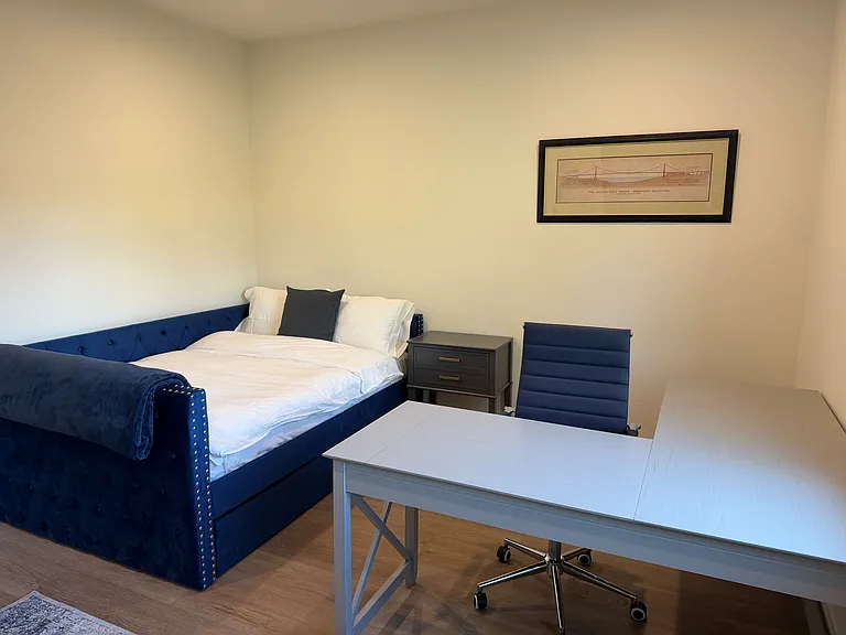 Main level bedroom that doubles as an office