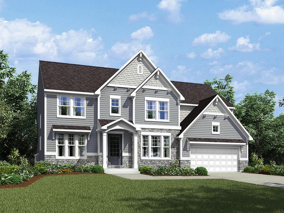 two-story home with siding, shakes and stone