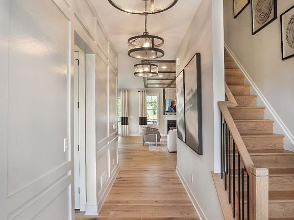 Inviting Foyer Leads to Open Living Area