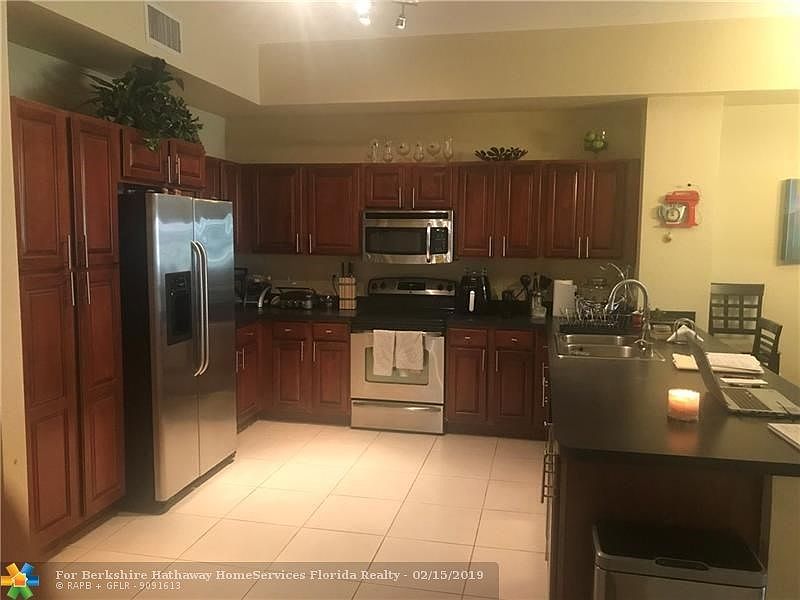 Open Kitchen Concept Stainless Steel Appliances
