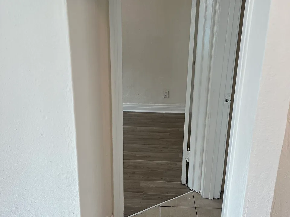 Hallway to bedroom and bathroom