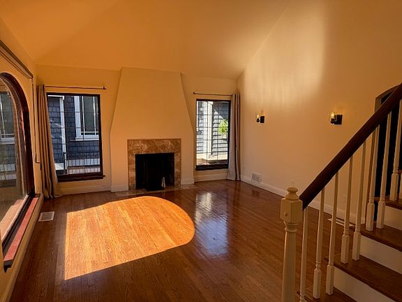 Living room with wood burning fireplace