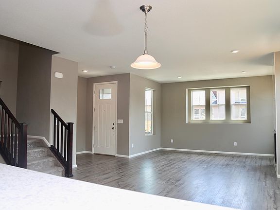 Open living room, dining room and kitchen