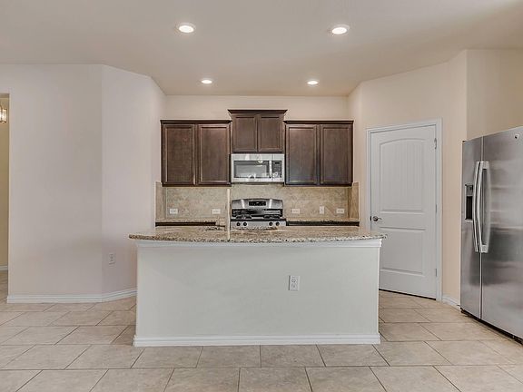 4th image of 7212 Vail Ridge St