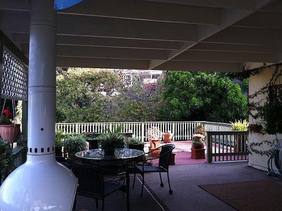 Covered private deck to uncovered portion of private deck