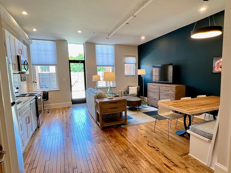 Spacious and serene living area on main floor. Direct access to patio.
