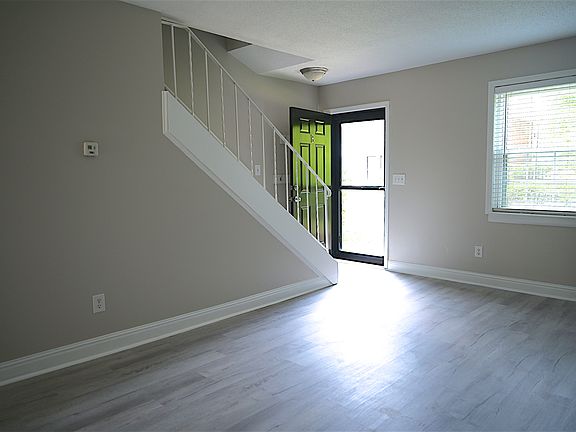 Living room as is today with new paint and flooring.