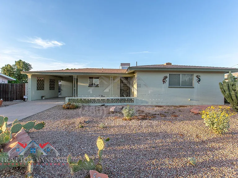 5706 E Des Moines St — Photo 1