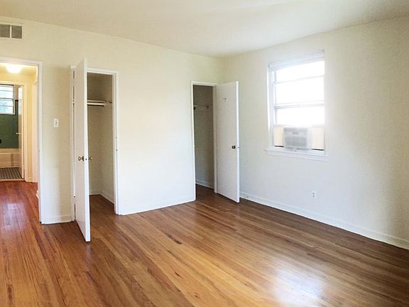 bedroom with 2 closets