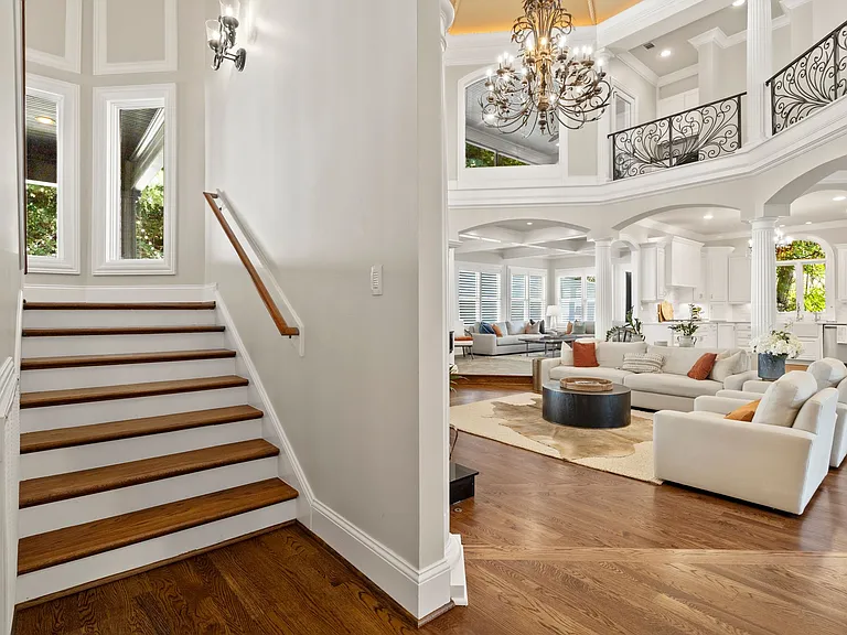 Stairs off Great Room to Second Floor or Elevator is an option