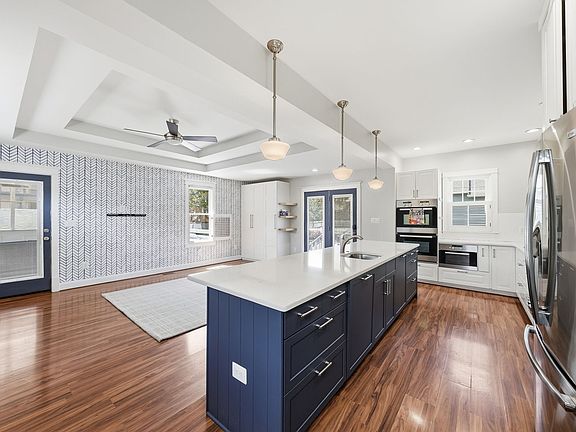 Open-concept kitchen overlooking the family room