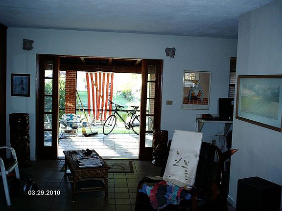 Dining rm, french doors, porch.