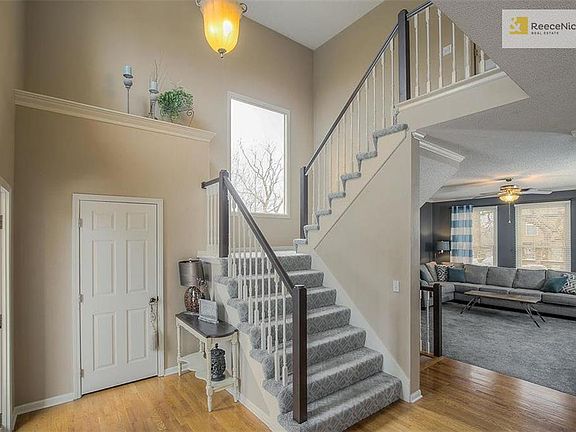 Walk in to the soaring ceilings and hardwood floors.