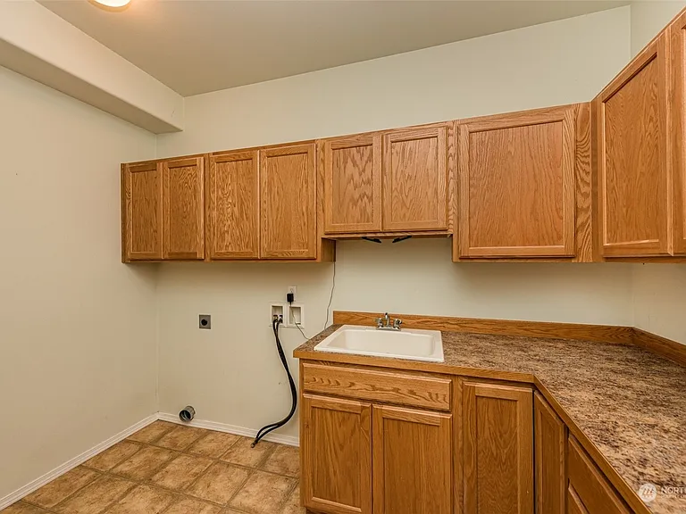Large laundry room with tons of cabinets