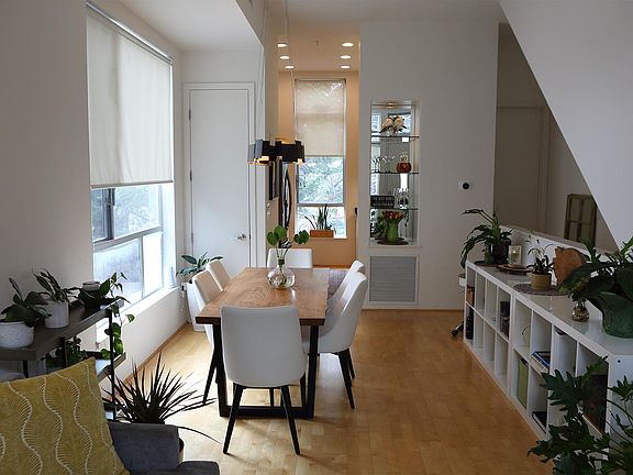 Dining room leading to kitchen.