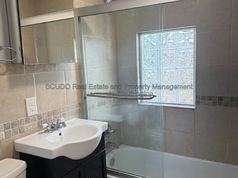 418 E 63rd Ter — Photo 11