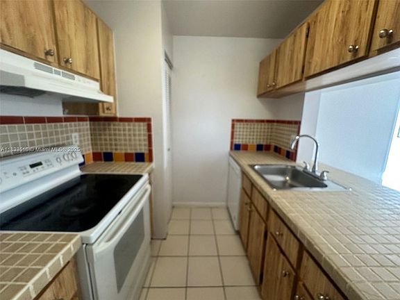 3rd image of 9808 Hammocks Blvd APT 204-23