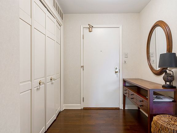 Gracious foyer with large guest closet.