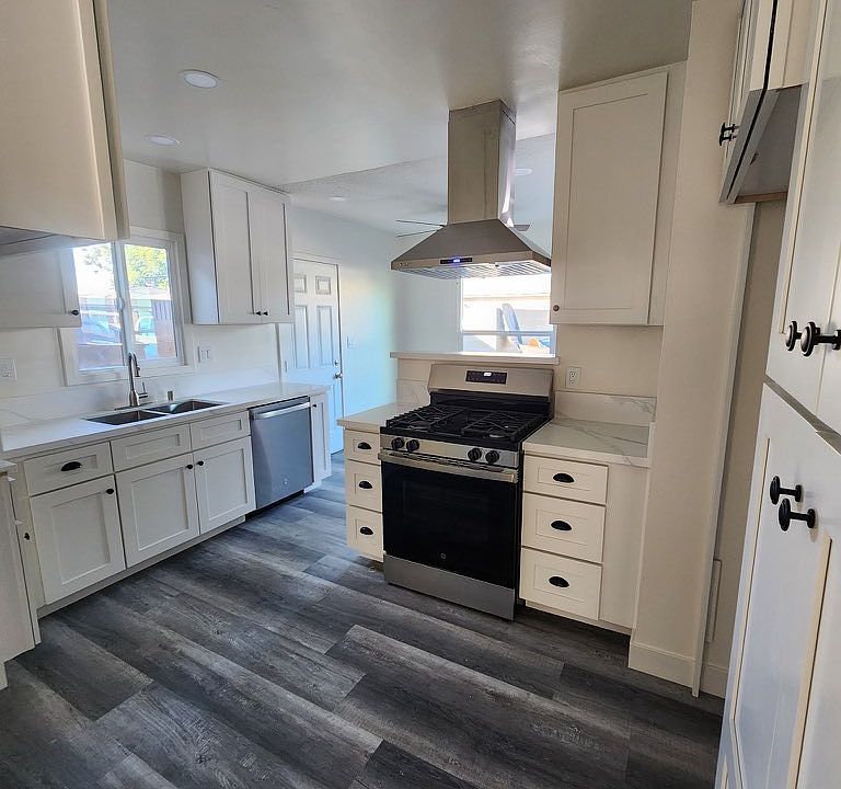 New kitchen with dishwasher and oven