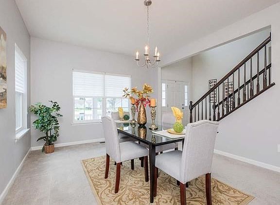 FORMAL DINING ROOM WITH CUSTOM SILHOUETTE SHADES
