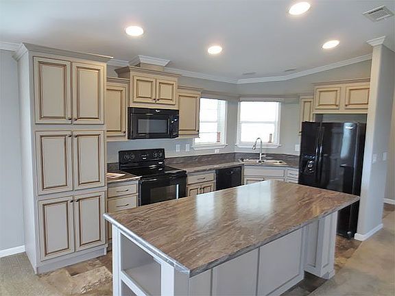 Kitchen bfore new frig/range