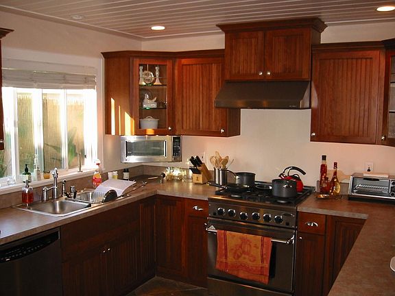 Kitchen with GE Profile stainless steel appliances