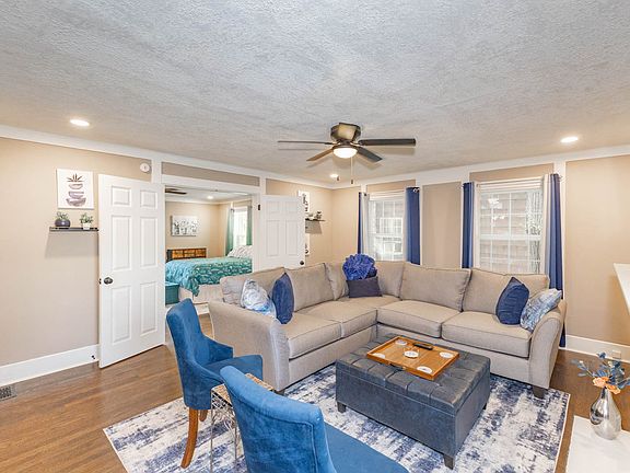 Comfy living area for relaxing after a long day with easy access to the bedroom.