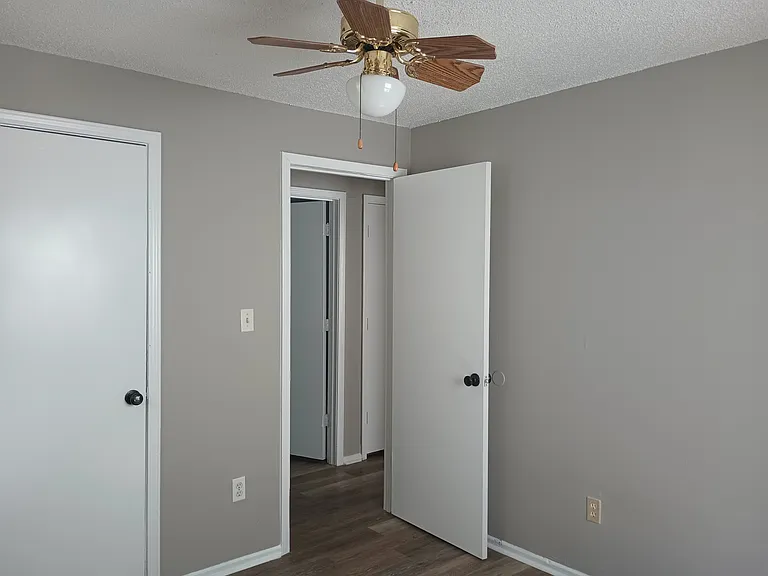 Third Bedroom with Ceiling Fan and Walk-In Closet