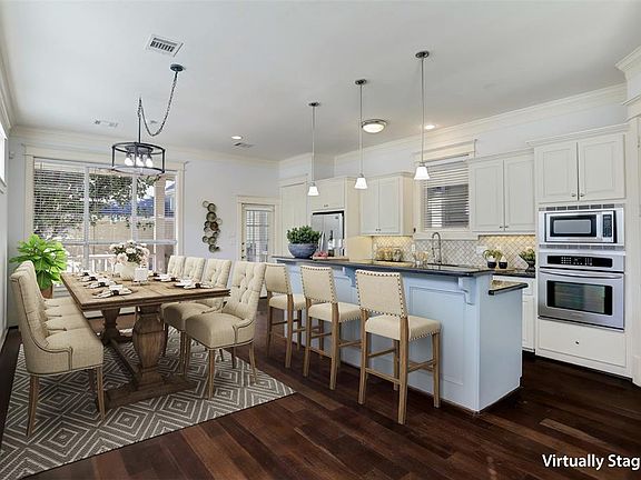 You will love all the natural light in this open concept dining & galley kitchen.