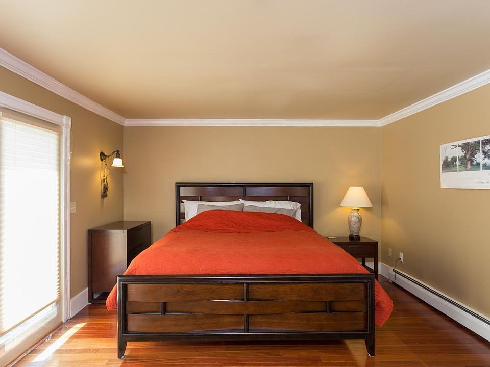 Master with king size bed, door to back deck