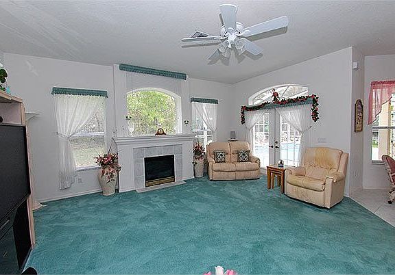 FAMILY ROOM WITH GAS FIREPLACE AND REMOTE CONTROL