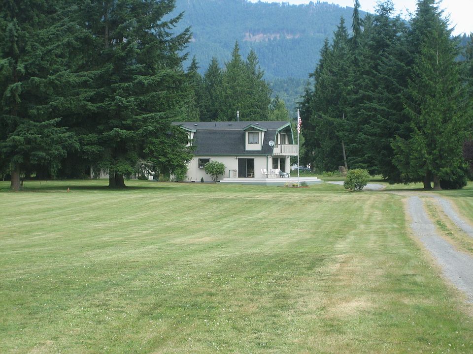 2 acres front/ 5+ in back