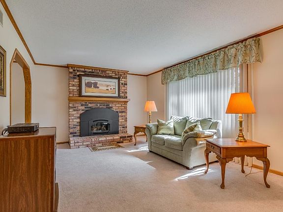 Bright and spacious living room. All newer windows throughout!