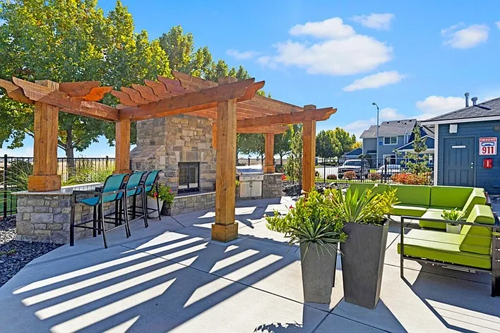 Beautiful Cabana Area with a BBQ Gas Grill and Picnic Seating Area