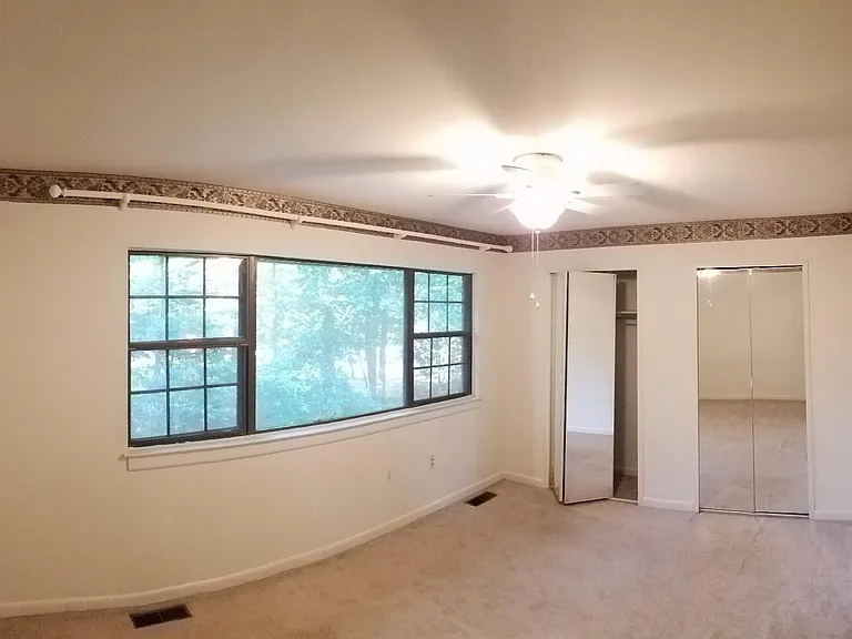 MASTER BEDROOM WITH THE BAY WINDOW