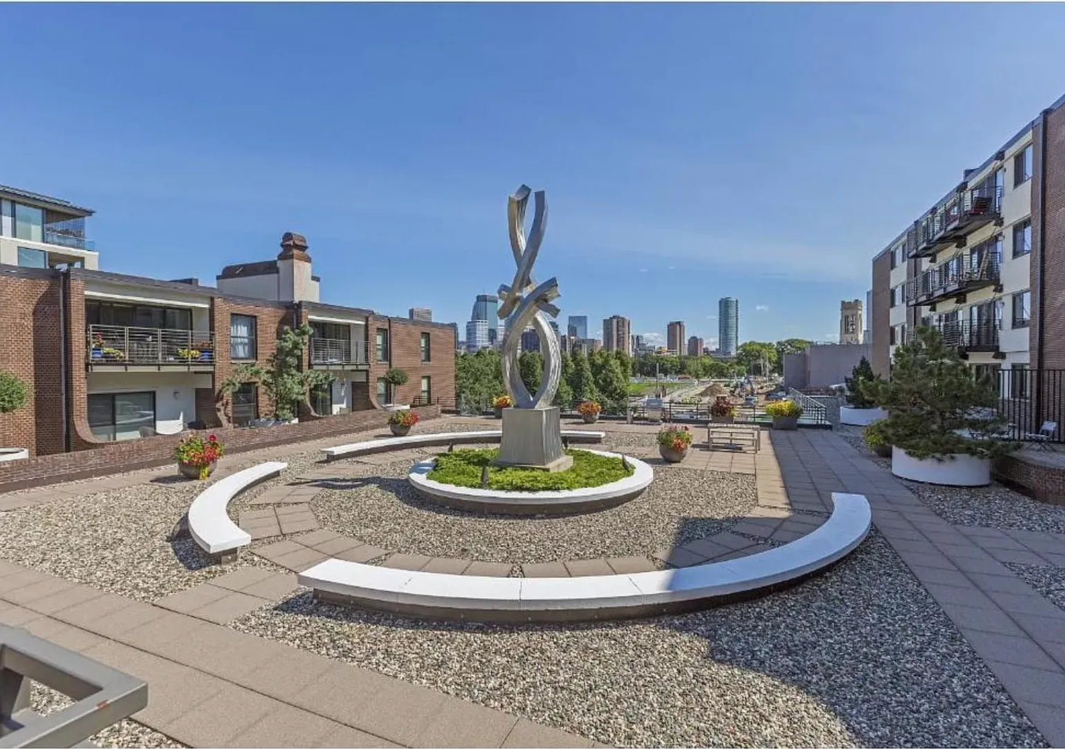 Lowry Hill 1BR w/ Skyline Views + Heated Garage | 745 SF — Photo 1