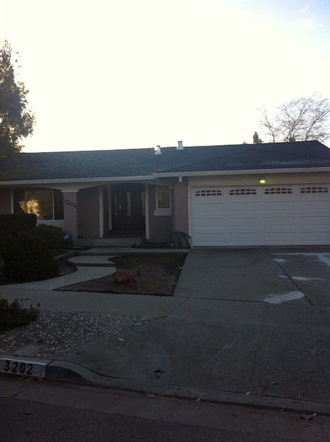 Front of home, dual pane windows throughout home, gardener i